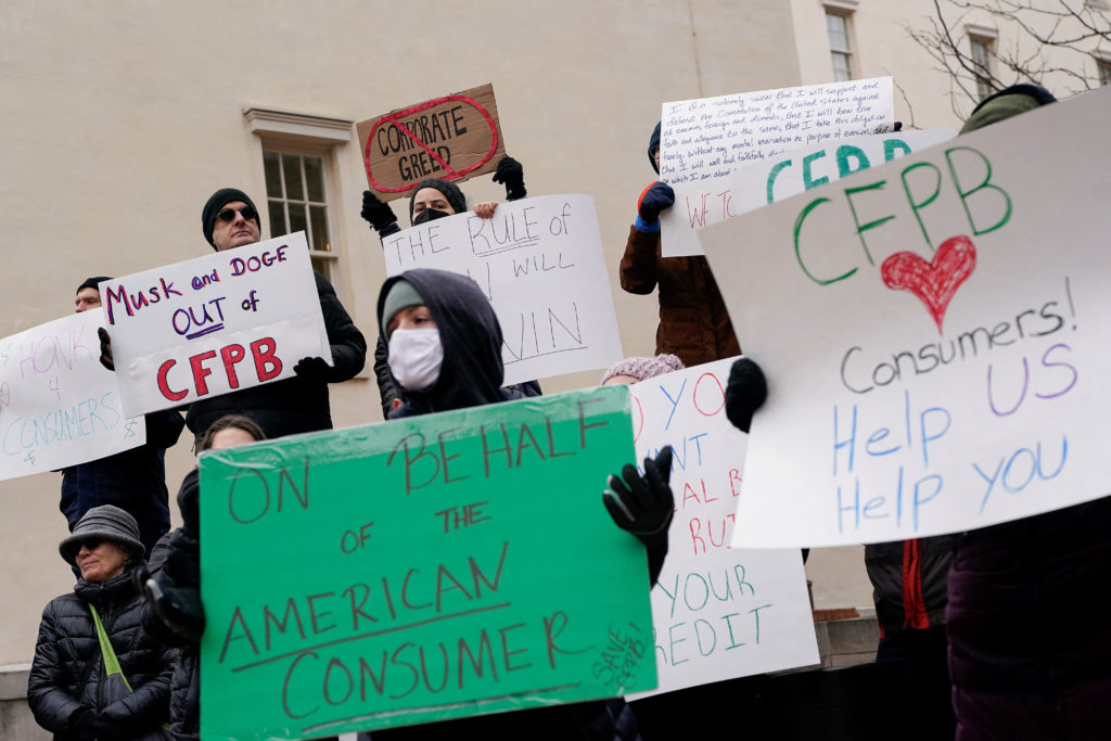 Protest the day after members of Elon Musk's Department of Government Efficiency moved into the CFPB, in Washington